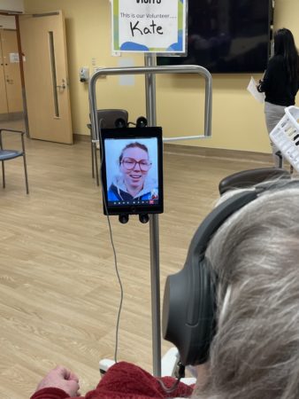 A patient connect with a family member virtually